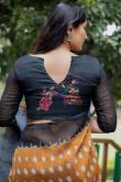 Printed Party Wear Saree in Carrot Orange Linen
