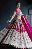 Cerise Pink Net Embroidered Wedding Wear Lehenga 