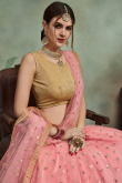 Coral Pink Sequins Embroidered Net Lehenga For Sangeet 