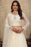 Cream Beige Net Lehenga With Sequins Work For Weddings