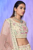 Cream Embroidered Georgette Party Wear Lehenga 