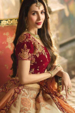 Graceful Cream Silk Lehenga with Red Velvet Choli 