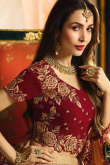 Graceful Cream Silk Lehenga with Red Velvet Choli 