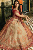 Graceful Cream Silk Lehenga with Red Velvet Choli 