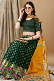 Dark Green Art Silk Woven Zari Panelled Style Lehenga