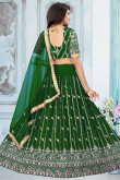 Sequins Work Wedding Wear Lehenga in Dark Green Georgette