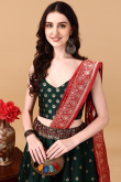 Dark Green Silk Woven Zari Panelled Style Lehenga