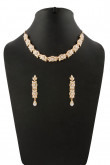 Golden Studded Necklace with Jhumka earrings.