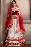 Ivory Net Lehenga With Velvet Choli