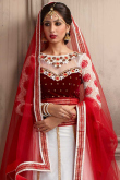 Ivory Net Lehenga With Velvet Choli