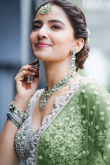 Dusty Green Net Embroidered Lehenga For Mehndi 