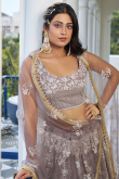 Dusty Mauve Net Sequins Embroidered Flared Style Lehenga
