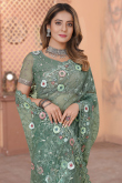 Dusty Mint Green Heavy Embroidered Net Saree 