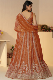 Dusty Orange Tissue Silk Embroidered Flared Style Lehenga