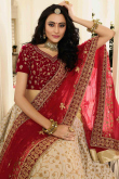 Embroidered Cream Silk Lehenga With Velvet Choli