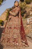 Embroidered Net Maroon Bridal Wear Lehenga