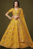 Embroidered Turmeric Yellow Silk Lehenga Choli For Hadi 