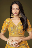 Embroidered Turmeric Yellow Silk Lehenga Choli For Hadi 
