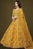 Embroidered Turmeric Yellow Silk Lehenga Choli For Hadi 
