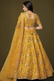 Embroidered Turmeric Yellow Silk Lehenga Choli For Hadi 