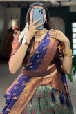 Emerald Green Weaved Zari Silk Flared Style South Indian Lehenga