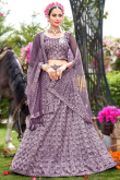 Ethnic Sequins Embroidered Net Lehenga In Dusty Mauve 