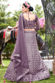 Ethnic Sequins Embroidered Net Lehenga In Dusty Mauve 