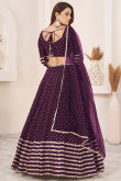 Georgette Sequins Embroidered Purple Panelled Style Lehenga 
