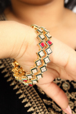 Gold-Pleated Kundan-Studded Traditional Bangles
