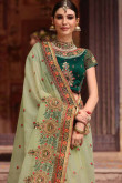 Green Silk Saree With Velvet Blouse