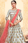 Pista Green Silk Brocade Lehenga with Peach Net Dupatta