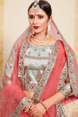 Pista Green Silk Brocade Lehenga with Peach Net Dupatta