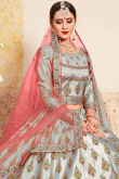 Pista Green Silk Brocade Lehenga with Peach Net Dupatta