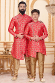 Jacquard Carrot Red Father-Son Duo Sherwani With Churidar