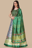 Green Silk Lehenga with Halter Neck Blouse in Resham & Sequins Work