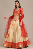 Light Orange Silk Woven Zari Lehenga
