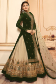 Bottle Green Net Lehenga with Silk Choli