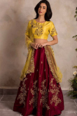 Maroon Lehenga with Yellow Choli Embellished in Zari & Stone