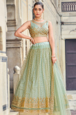 Mint Green Sequins Embroidered Net Lehenga For Mehndi 