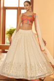Muqqaiyyash Embroidered Georgette Cream Lehenga