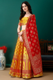 Mustard Yellow Art Silk Woven Zari Panelled Style Lehenga