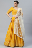 Mustard Yellow Wedding Wear Sequins Work Lehenga in Georgette