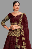 Net Dark Maroon Embroidered Panelled Style Lehenga
