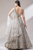 Net Dori Embroidered Cream Beige Panelled Style Lehenga 