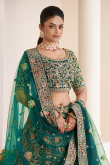 Net Teal Blue Sequins Embroidered Panelled Style Lehenga 