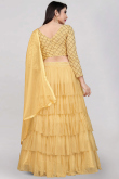 Net Yellow Zari Embroidered Layered Style Lehenga 
