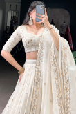 Off White Crushed Organza Lehenga With Zari Work For Festival