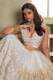Off White Net Embroidered Flared Style Lehenga 