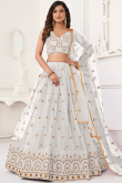 Ivory Sequins Embroidered Net Lehenga For Sangeet 