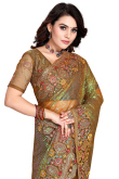 Dori Work Party Wear Saree in Olive Brown Net